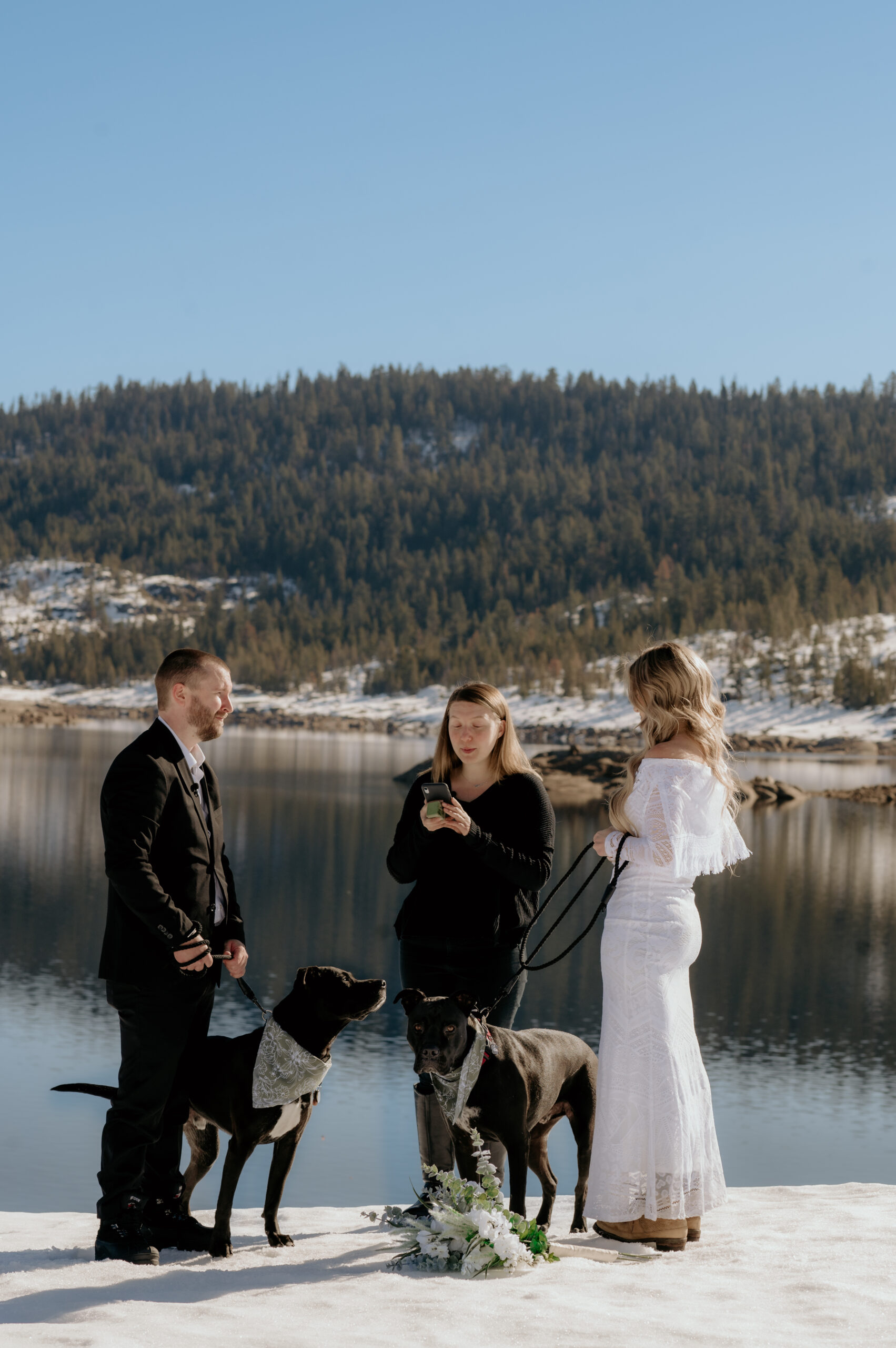 Romantic snowy elopement ceremony with close friends