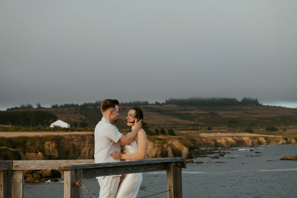 A couple embraces during their engagement photoshoot