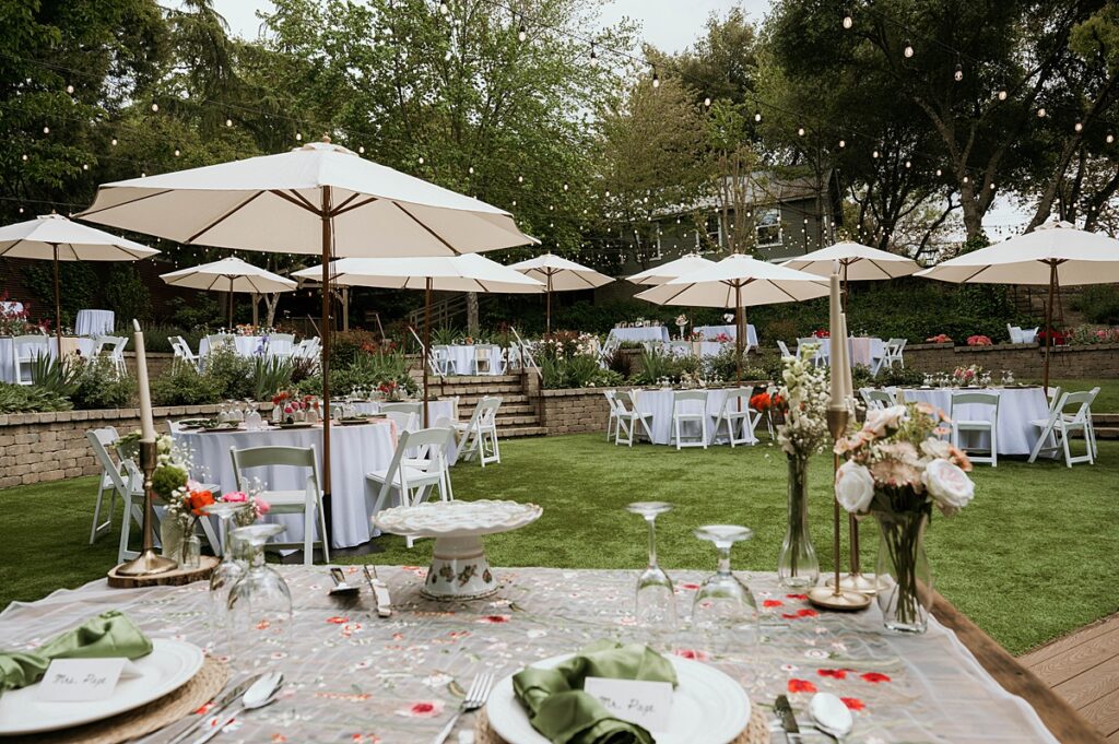 An outdoor wedding reception set up is photographed at Hanford Garden 