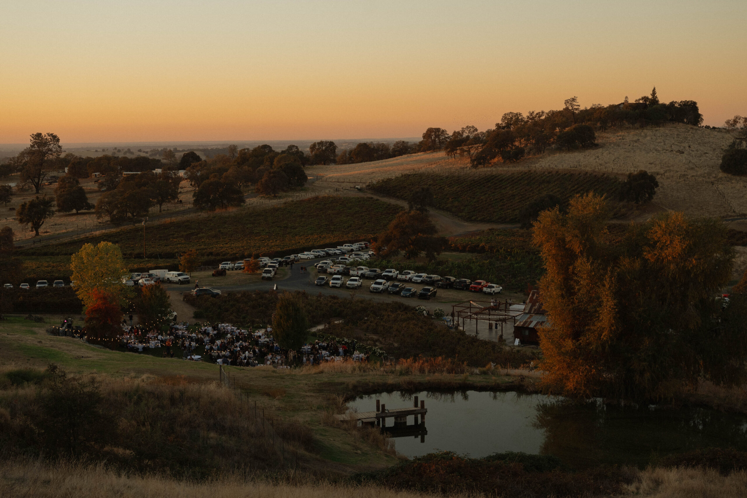 Aerial View of Cazadd Cellars full of wedding guests and the rolling golden hills of California