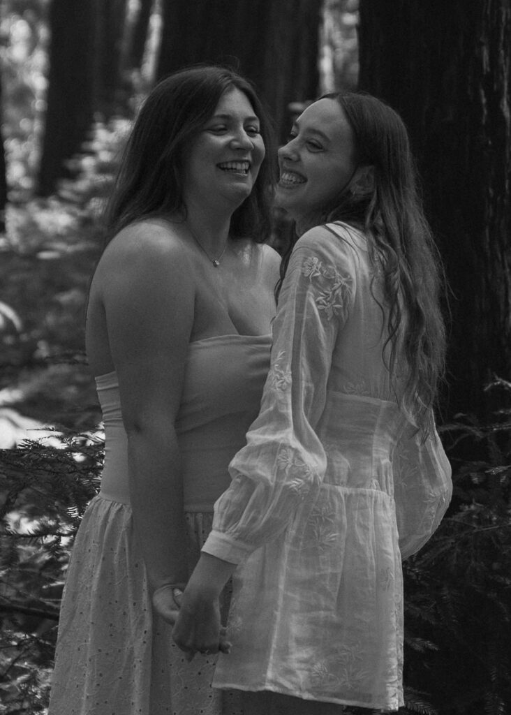 Newly engaged couple embracing, captured by an Oregon proposal photographer